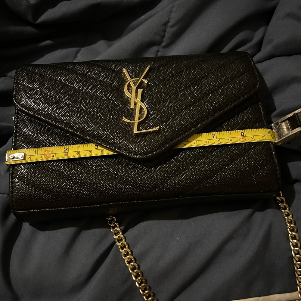 YSL black leather clutch
